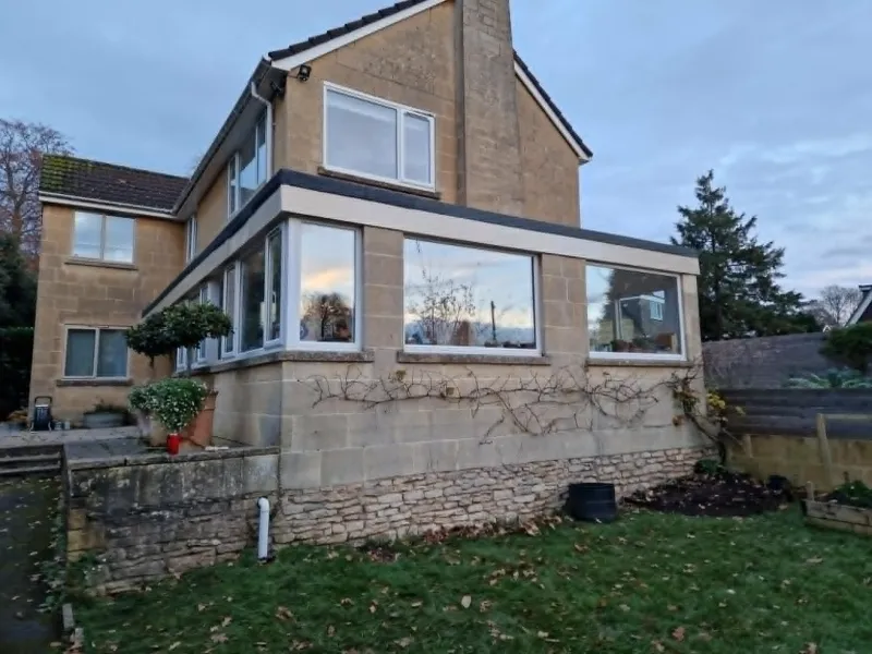 Exterior painting on a Bath stone terrace — masonry and woodwork