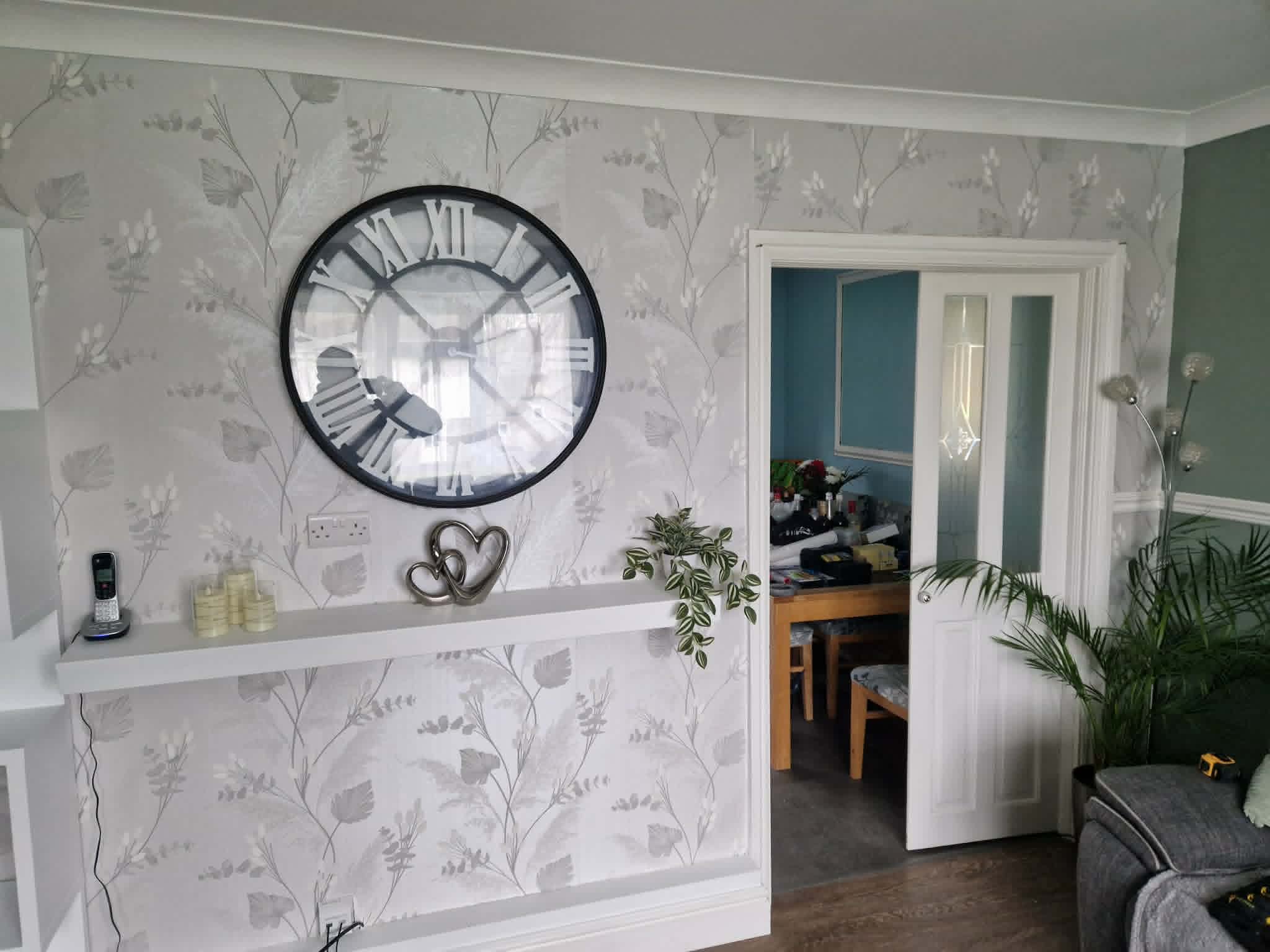 Wallpapering with dado rail and pattern matching in a Bath living room